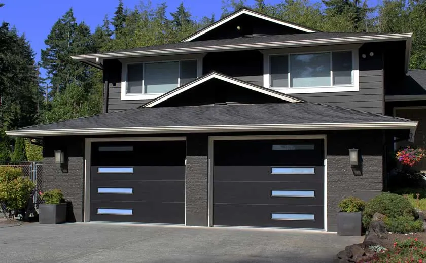 After: two flush dark doors, each with a column of slim windows