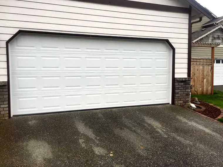 After: a white raised-panel steel sectional
